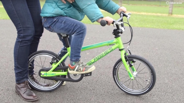 teach an older child to ride a bike